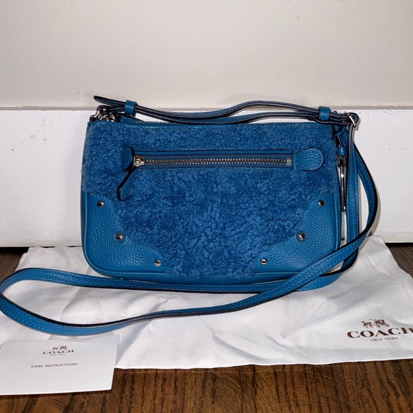 Coach Handbags - COACH Rhyder Blue Shearling Crossbody Pochette